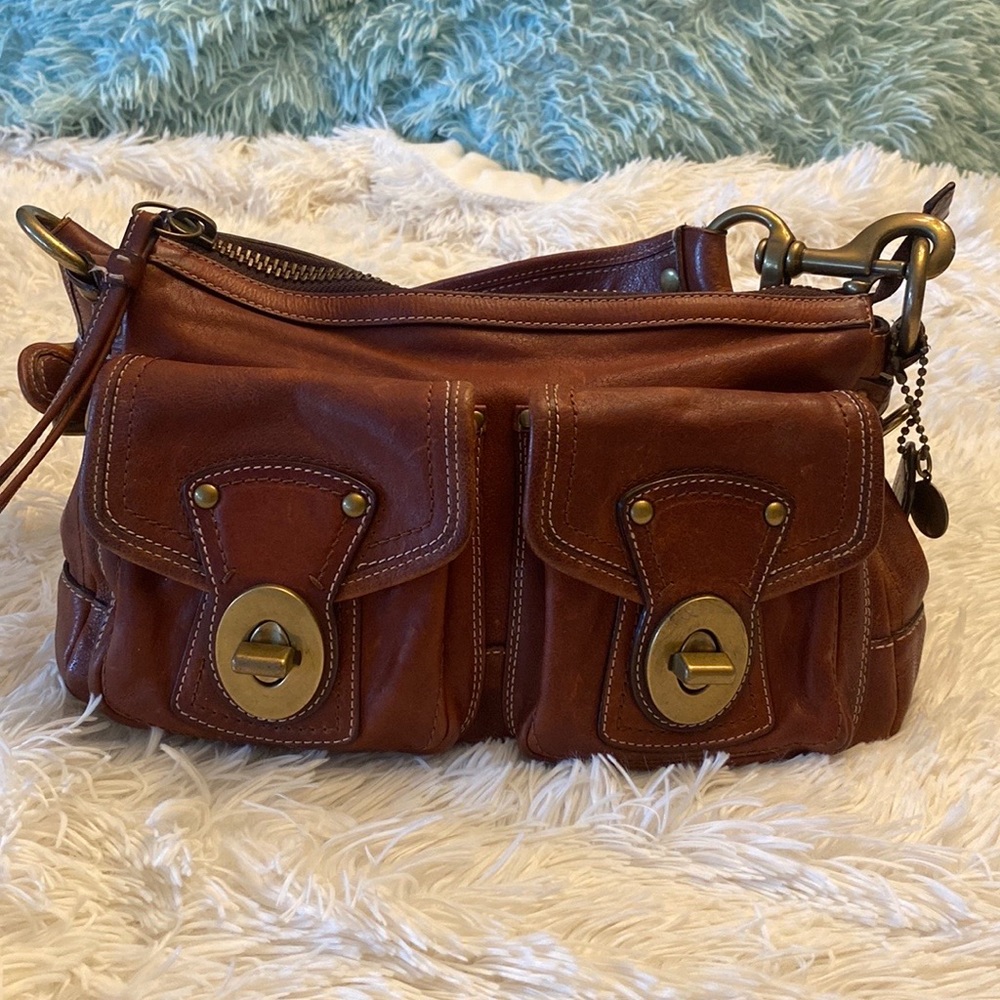 Coach brown leather handbag, striped satin liner, 13inW/7inH..strap is 8in.